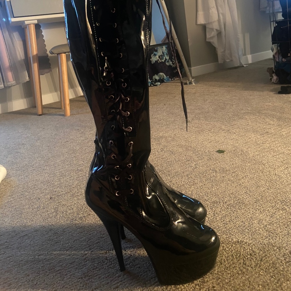 Thigh high stripper heels
